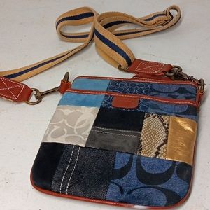 Blue and black and gold it's a long strap list woman's purse